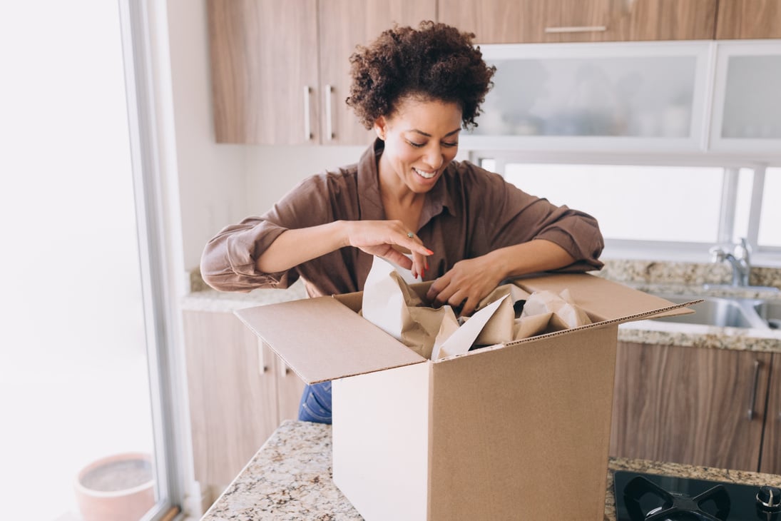 Moving In Woman Packing Boxes